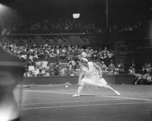 Miss Joan Fry beaten at Wimbledon, seen here in play. 29 June 1929