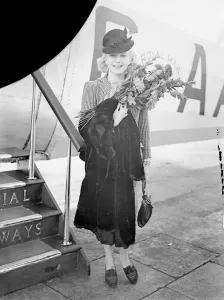 Miss Liliane Gills, Miss Paris 1938, arrived at Croydon Aerodrome from Paris to