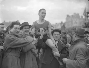 Mitcham wins London Brighton relay. Brookwood finishes first by a second. First