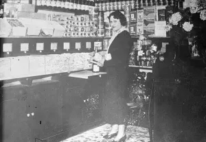 Mlle. Cotillon at the shop in which she will now work in Paris. She was mentioned