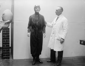 A model of Amy. Mr Louis Tussaud putting the finishing touches to a pleasing wax