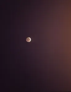 Hallow Prints: Moon in the night sky. Crescent moon with the reflection of sunlight thrown by