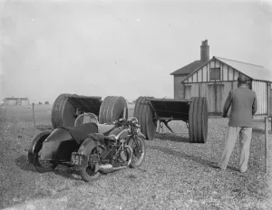 Sidecar Prints: Motorbikes parked on the Dungeness beach in Kent. 1936