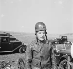 Motorcycle racing at Brands Hatch, Kent. A rider poses for a photo