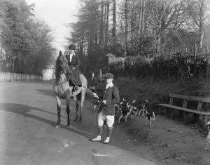 Prints of Mounted followers of beagles and a lady Master at Sheldwick Corner near Faversham, Kent. Miss J B Dawes, the Master at the meet 15 December 1922 1920s Prints: Mounted followers of beagles and a lady Master at Sheldwick Corner near Faversham, Kent