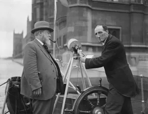 MPs inspect lifeboats off the House of Commons. Mr Loverseed, MP ( right ) explaining