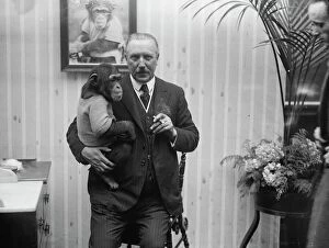 Animals Collection: Mr Cherry Keartons wonderful chimpanzee accompanies him in his film lecture