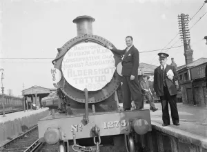 Mr David Behar poses on a train for the Dartford Division of Kent Conservative