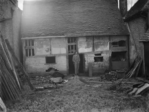 Mr Greenfield at an old dilapidated cottage, wich is to be used as a museum in Eynsford