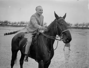 Mr Hore Belisha spends his holiday - on horseback. Away from transport problems