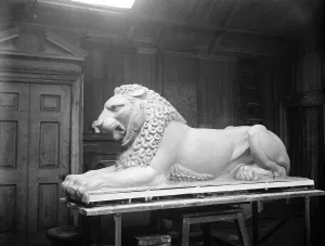 Mr J Bickerdyke at work on model of one of two lions to be placed at main entrance to Stowe School