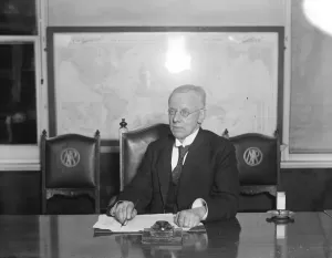 Desk Prints: Mr Mcara ( N P A ) in board room. February 1927