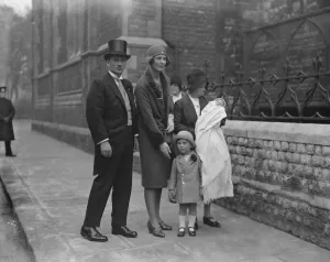 Mr and Mrs Robin Grosvenor with their small son and infant daughter after the latter