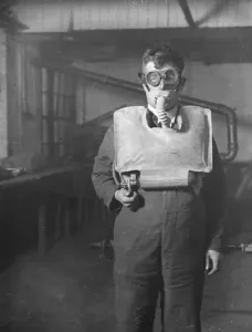 Emergency Prints: Mr R H Davis, managing director of Siebe, Gohman and Co, with the new apparatus