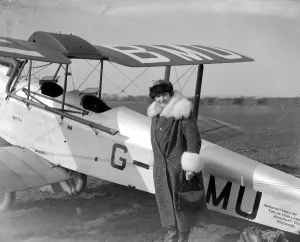 Mrs Alan Cobham leaving Stag Lane Aerodrome to meet her husband in mid air. 13 March
