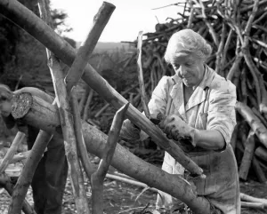 Woodwork Prints: Mrs Henniker making fencing poles at Chilham Kent 1949