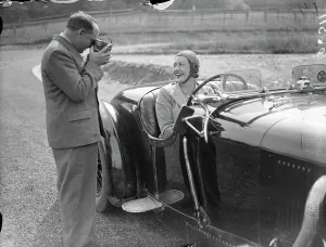 Husband Prints: Mrs Roy ( Marjorie ) Eccles being filmed by her husband before racing on the track