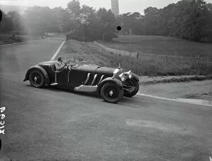 Press Photography Collection: Mrs Roy ( Marjorie ) Eccles making her circuit of the race track. The first woman