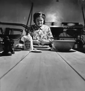 Public House Prints: Mrs. Temperley prepares a pie in the kitchen of the Globe Tavern