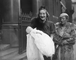 Mrs W F Dundas and her infant daugher after the christening at St Colombas Pont