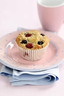 Berries Collection: Muffin with raspberries and blackcurrants credit: Marie-Louise Avery / thePictureKitchen