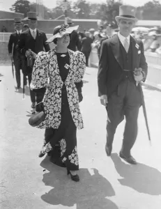 Musical hat fashion at Ascot. Ascot, on Royal Hunt Cup day, favoured with even