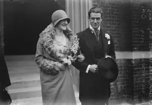 A Naval bridegroom. The marriage between Lt Com Allan Peachey RN, and Mrs Nina