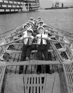 Wood Prints: Naval cadets rowing to the training ship HMS Worcester on the River Thames off Greenhithe