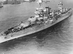 Naval majesty. A fine study of the US battleship Texas passing under Manhatten Bridge, New York