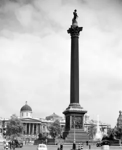 Cars Prints: Nelsons Column with the National Gallery building in the background Trafalgar Square