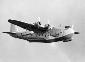 International Herald Tribune Prints: New Imperial Airways flying boat Cassiopeia in flight after taking off from Southampton