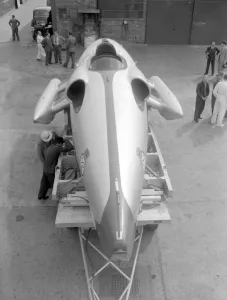 New Malden, Surrey: John Cobb, with his revolutionary speedboat Crusader, in which