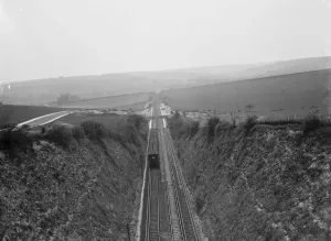 The new railway station near Eynsford, Kent. A locomotive pulls away from