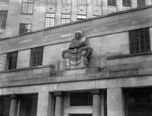 Exterior Prints: Night, Statuary by Epstein on the Underground Building at St James Park. ? TopFoto