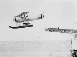 A novel catapult. An American scout Curtiss XF7C-1 Seahawk plane being launched