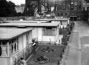 Living Conditions Prints: A number of prefabricated houses have been erected at the top fo Portland Place