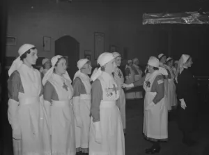 Apron Prints: Nurses of the Voluntary Aid Detachment on parade whilst being inspected by the War