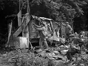 Family Collection: An old man watches on as a shack in Kingsdown is demolished. 1936