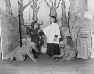 Old Mother Hubbard at the Homerton Deaf School Two little girls do their parts