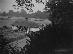 An old thatched roof cottage on Perry Street in Chislehurst, Kent