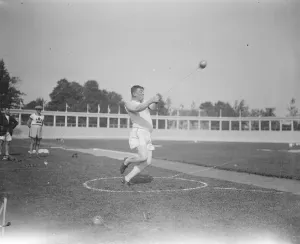 Olympic Games Prints: Olympic Games at Antwerp Patrick Ryan ( USA ) throwing the hammer. He threw