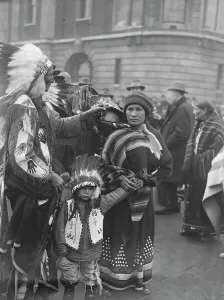 Original caption: Arrival of Red Indians in London. To appear at Olympia Circus