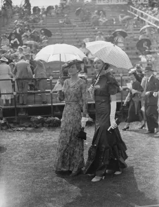 Parasols and fashions at Hurlingham. Two fashionable women spectators at Hurlingham