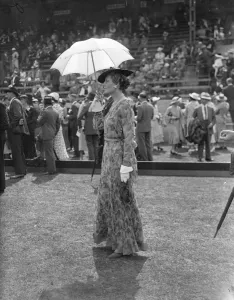 Parasols and fashions at Hurlingham. Two fashionable women spectators at Hurlingham
