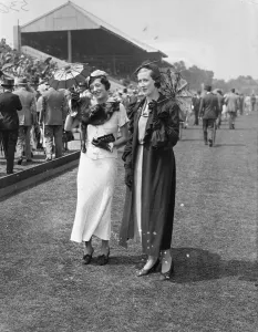 Parasols and fashions at Hurlingham. Two fashionable women spectators at Hurlingham