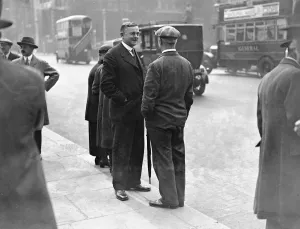 Politics Prints: Parliament re - assembles. Talking in the street is the Scottish Socialist Member of Parliament