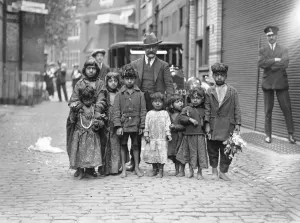 Party of Turkestan nomads travelling round Europe and billeted in some mews near