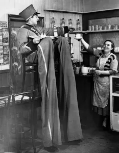 Fifties Prints: After patrolling the streets of Sidcup, Henry, a professional stilt walker