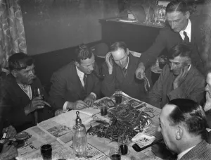 Paying in night at the Rat and Sparrow Club in Eynsford, Kent. Charlie Meadows