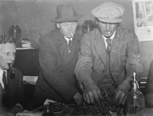 Paying in night at the Rat and Sparrow Club in Eynsford, Kent. Members get paid